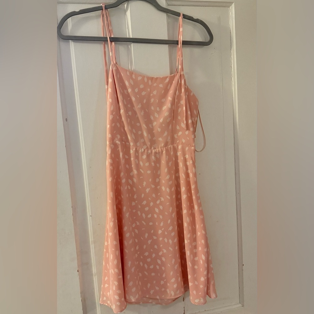 baby pink polka dotted dress
